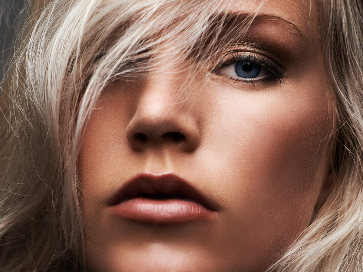 Blonde hair styled with soft dimension and movement